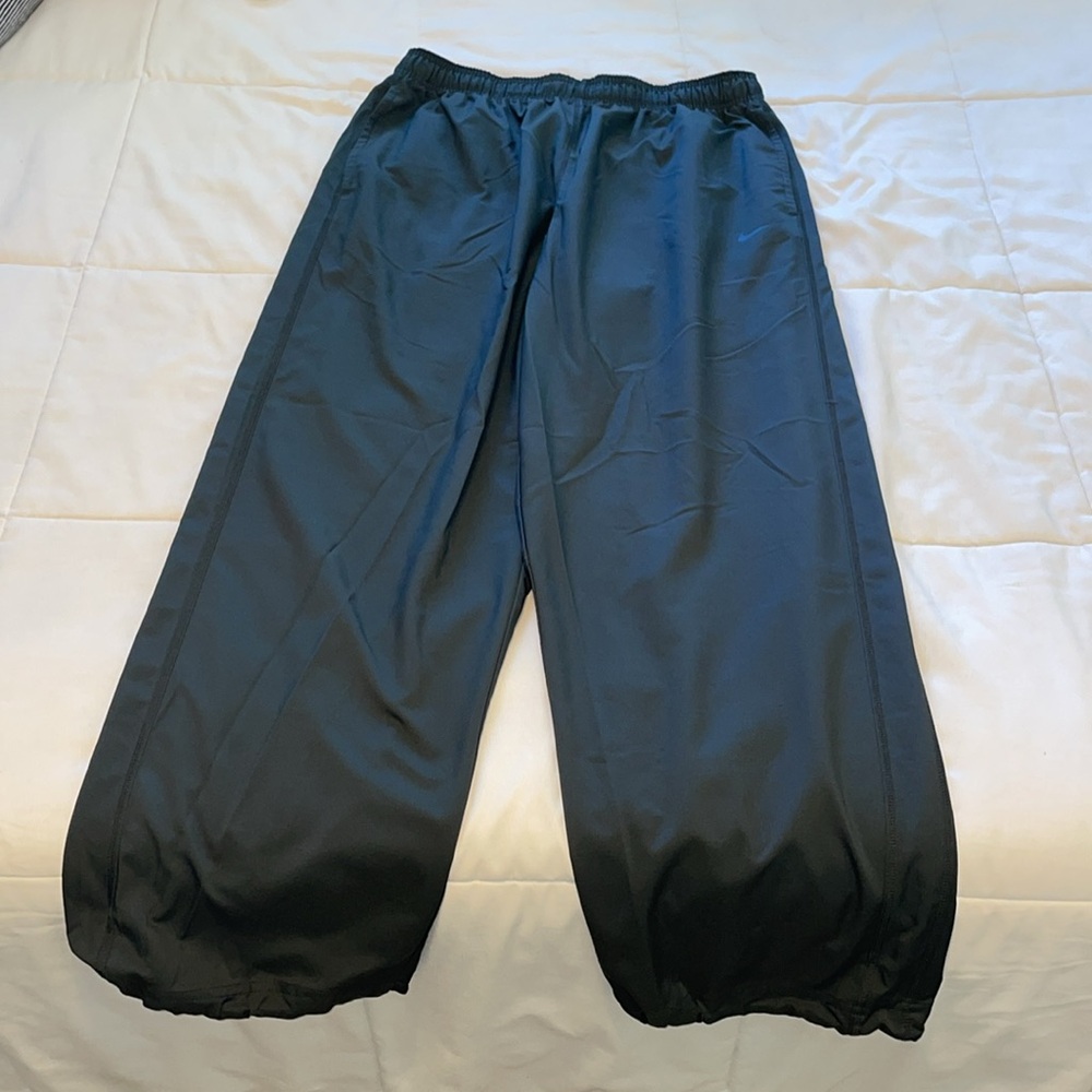Nike Dri-Fit track pants in 100% Poly. Men's size XXL. Like new condition. Nice!